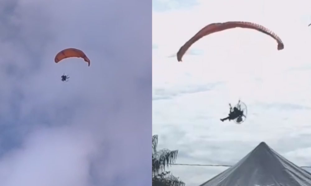 uma estrutura que inclui um motor com hélice, acoplado às costas do piloto, e um